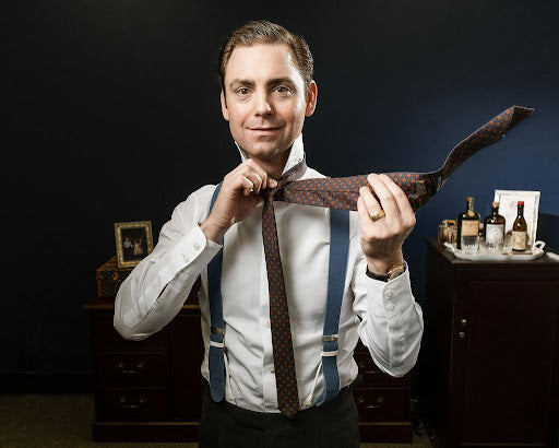 Kirby is pictured putting on one of our Sovereign Grade ties