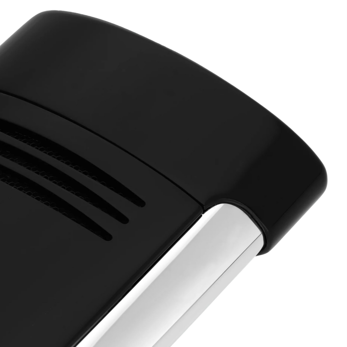 Close-up of a black electronic device with a metallic edge on a white background