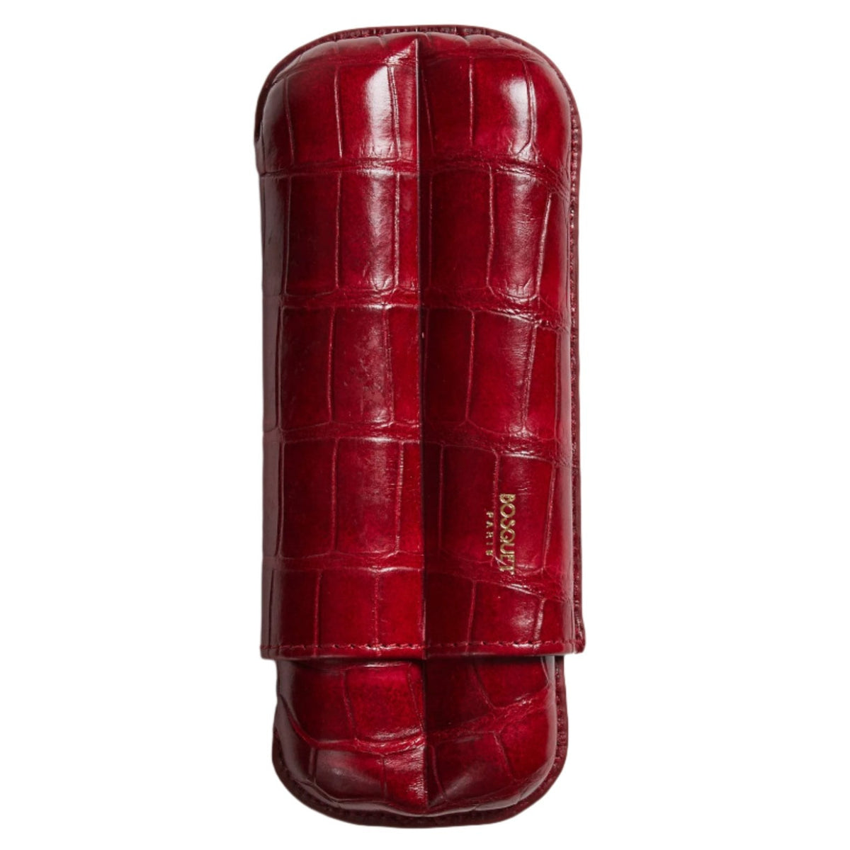 A Bosque Crocodile Cigar Case in Hermes Red on a white surface.