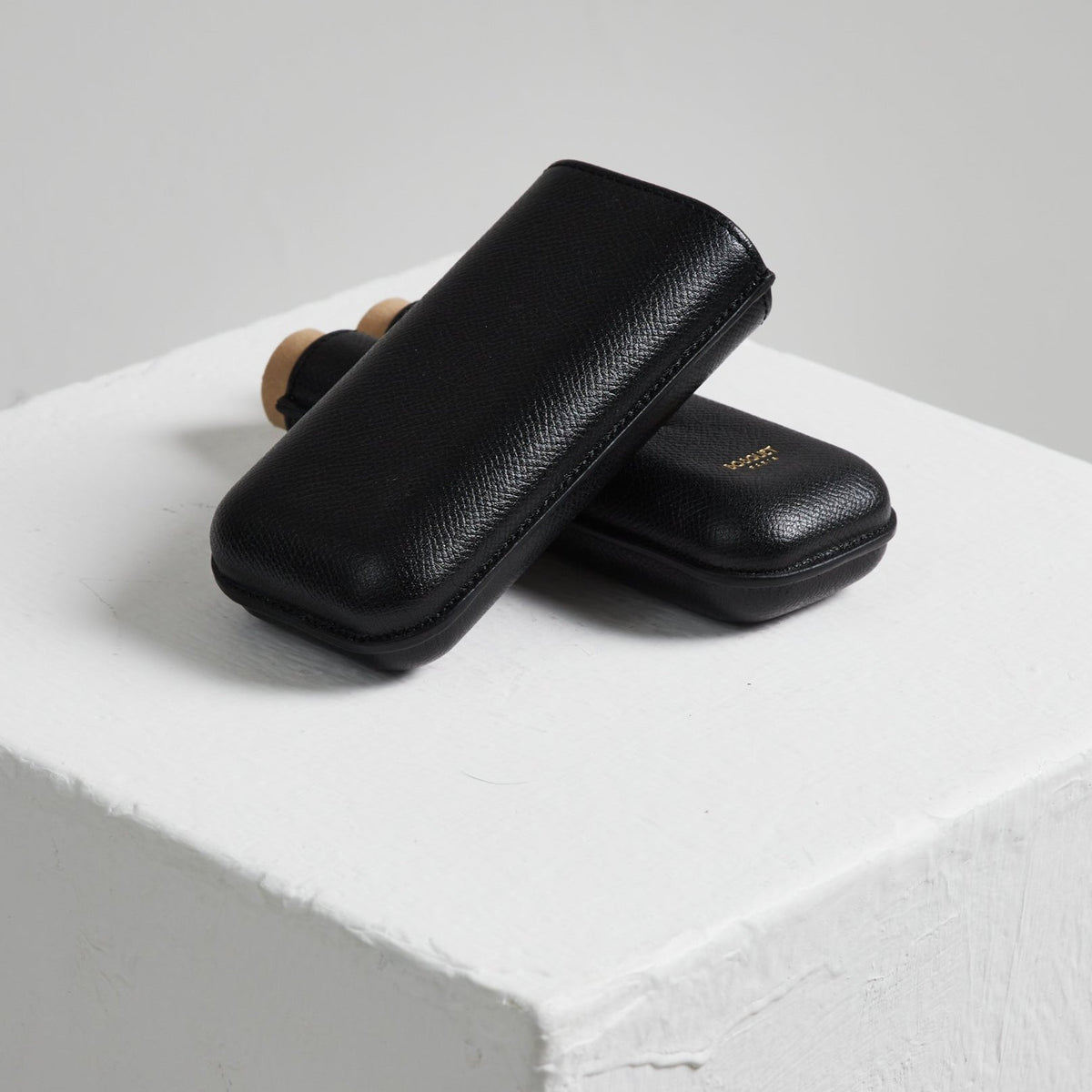 Two Bosquet Smooth Black Leather Cigar Cases.
