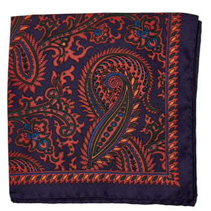 A tailor-made Sovereign Grade 100% Silk Large Paisley Navy Pocket Square provided by KirbyAllison.com, featuring luxurious silk with an intricate large paisley pattern in navy and orange, adding a sophisticated touch to your ensemble, set against a white background.
