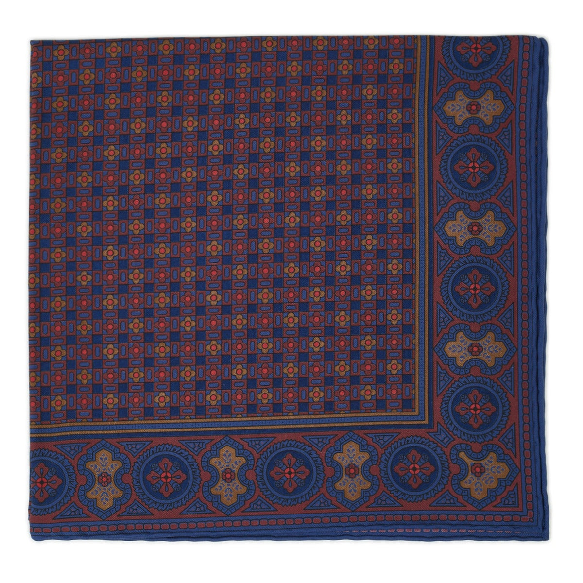A folded burgundy and navy geometric patterned silk pocket square.