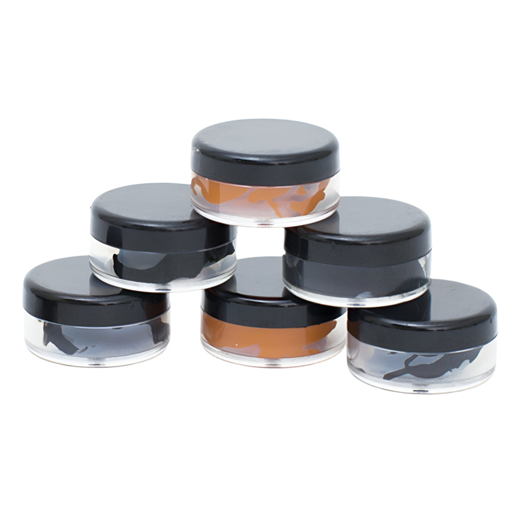 Five jars of Saphir Pommadier Cream Polish Samples with black lids for color matching shoe polish samples on a white background offered by KirbyAllison.com.