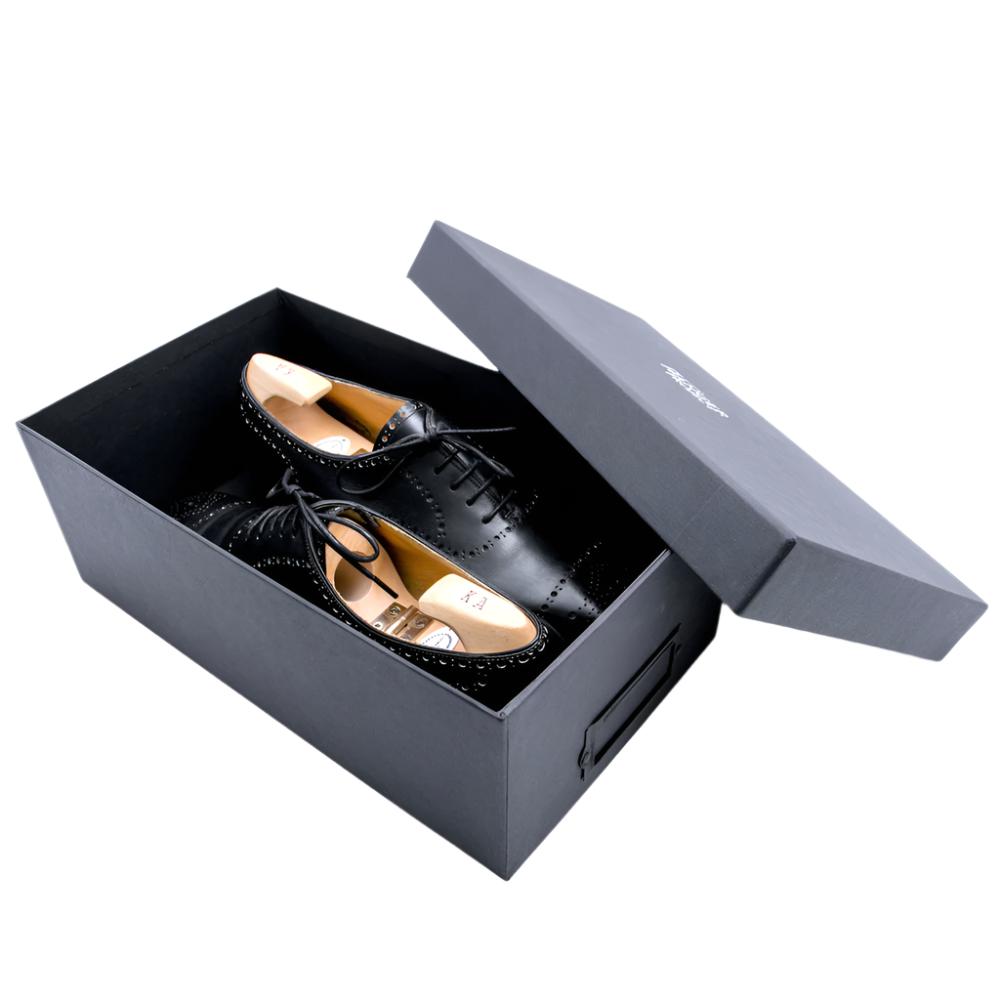 A pair of Deluxe Wellington Shoe Storage Box by KirbyAllison.com on a white background.