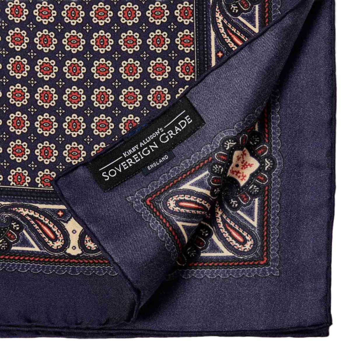 A Sovereign Grade 100% Silk Navy Pocket Square from KirbyAllison.com, blue paisley design, perfect for adding formality to an outfit.