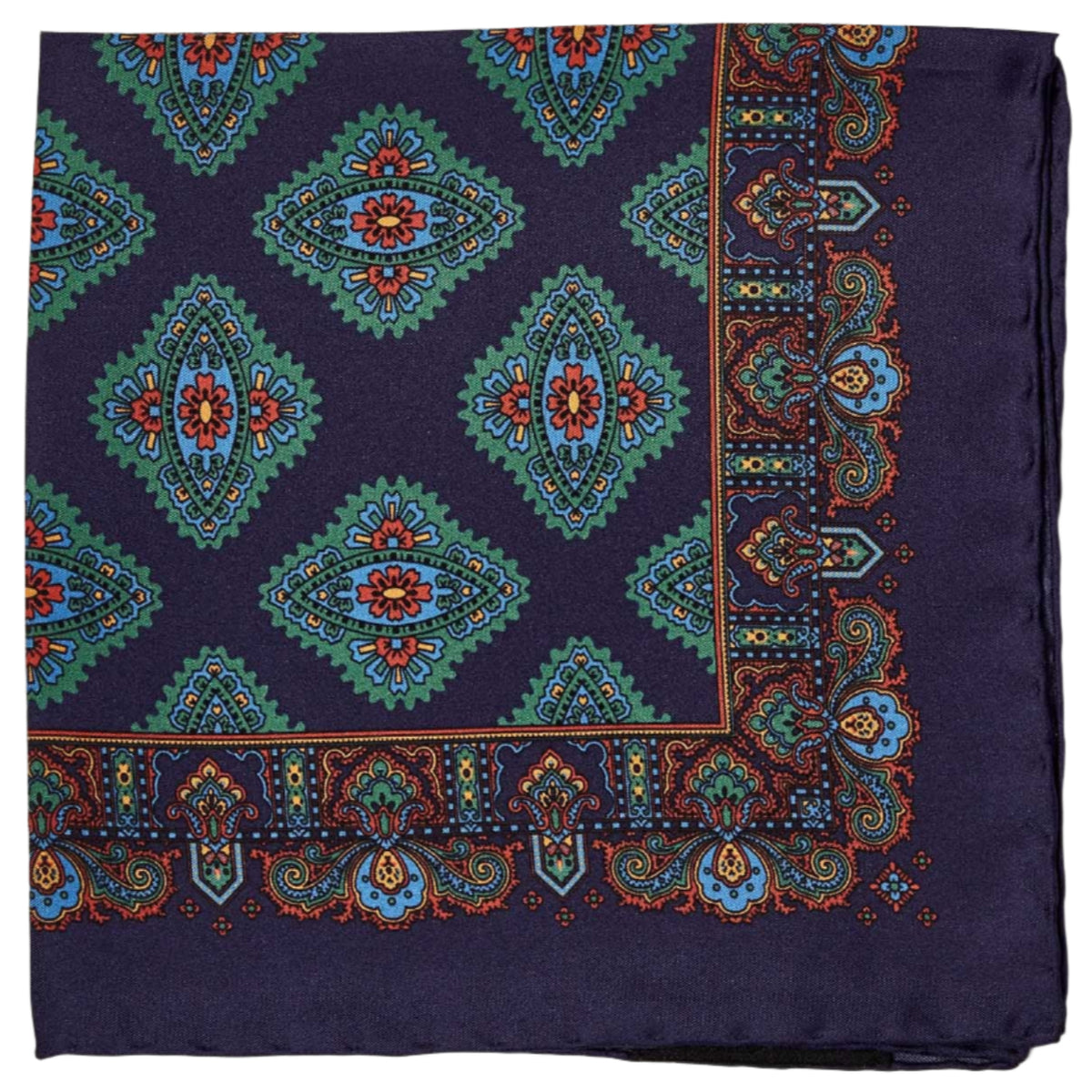 A Sovereign Grade 100% Silk Navy Pocket Square with a blue paisley pattern on a white background, from KirbyAllison.com.