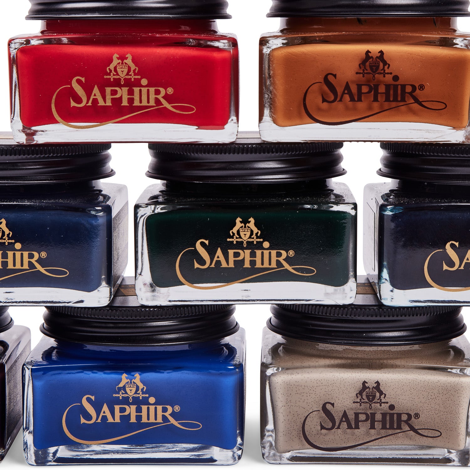 Photo displays several colors of Saphir Cream Shoe Polish