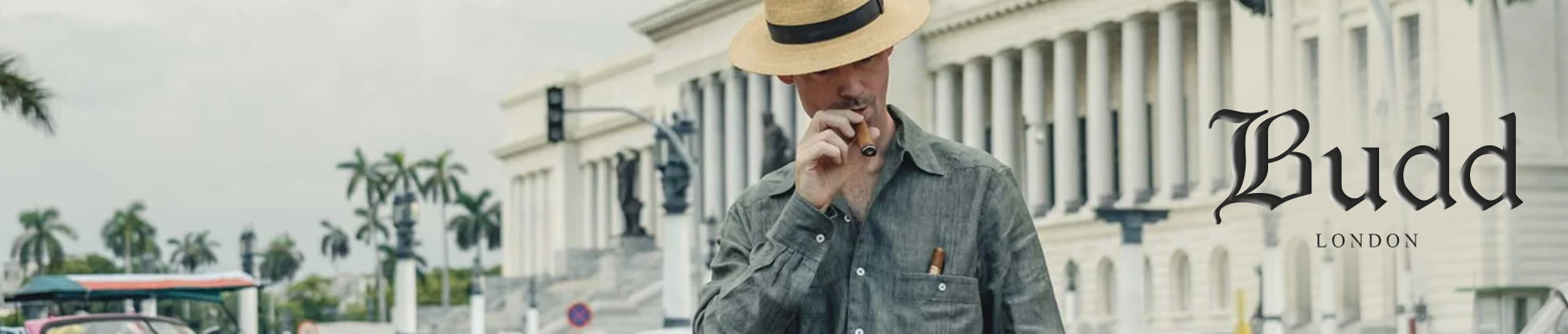 A clothing label reading "Kirby Allison x Budd" with size information "41 cm / 16" on a white fabric background.