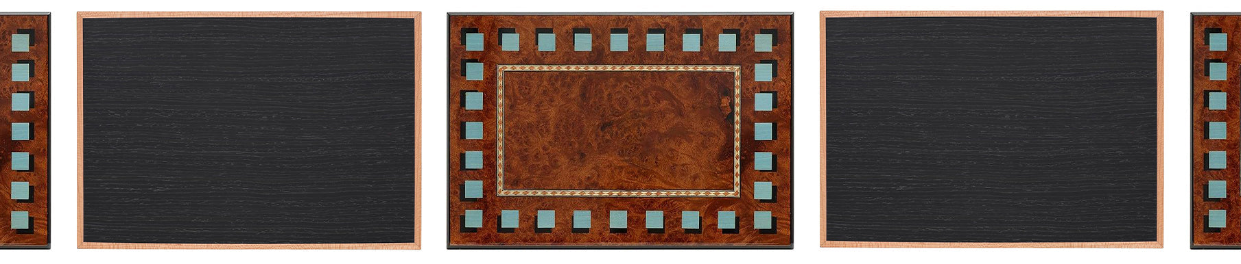 Four square wooden chessboards with black and brown sections, each bordered by small blue squares. The boards are lined up side by side with gaps between them.