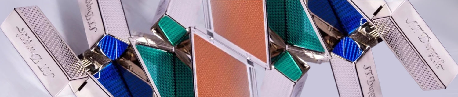 Close-up of a textured turquoise and silver rectangular object on a light surface, casting a shadow.