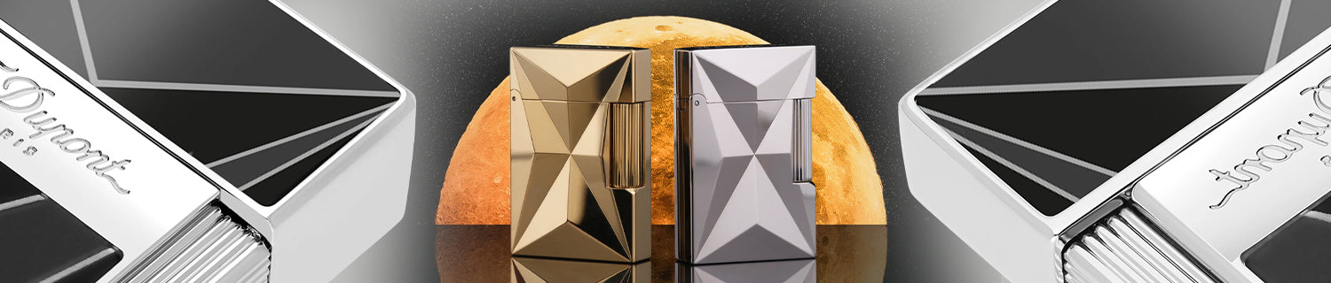 Close-up of the S.T. Dupont Paris logo on a blurred background with warm lighting.