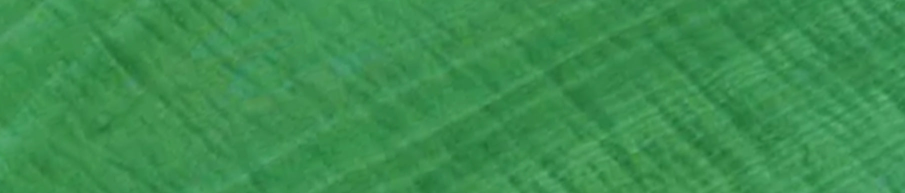 Red textured fabric surface with visible vertical and horizontal lines.