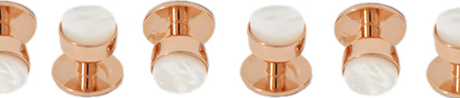 Five gold cufflinks with white circular tops are evenly spaced in a row against a white background.