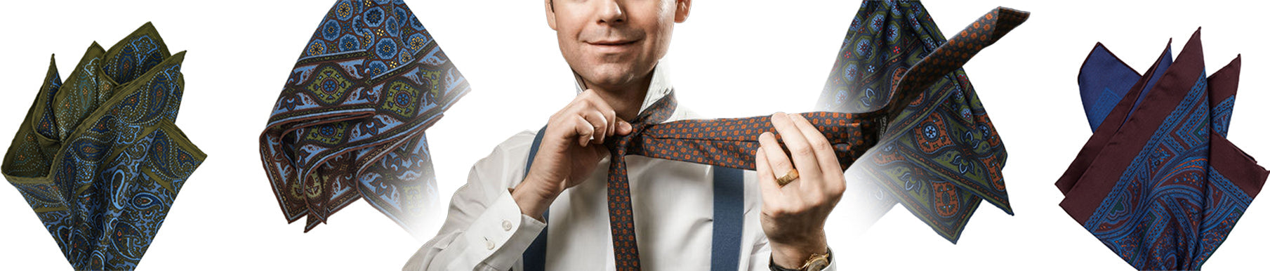 Man ties a patterned necktie, surrounded by four different colored pocket squares with paisley designs, all on a white background.