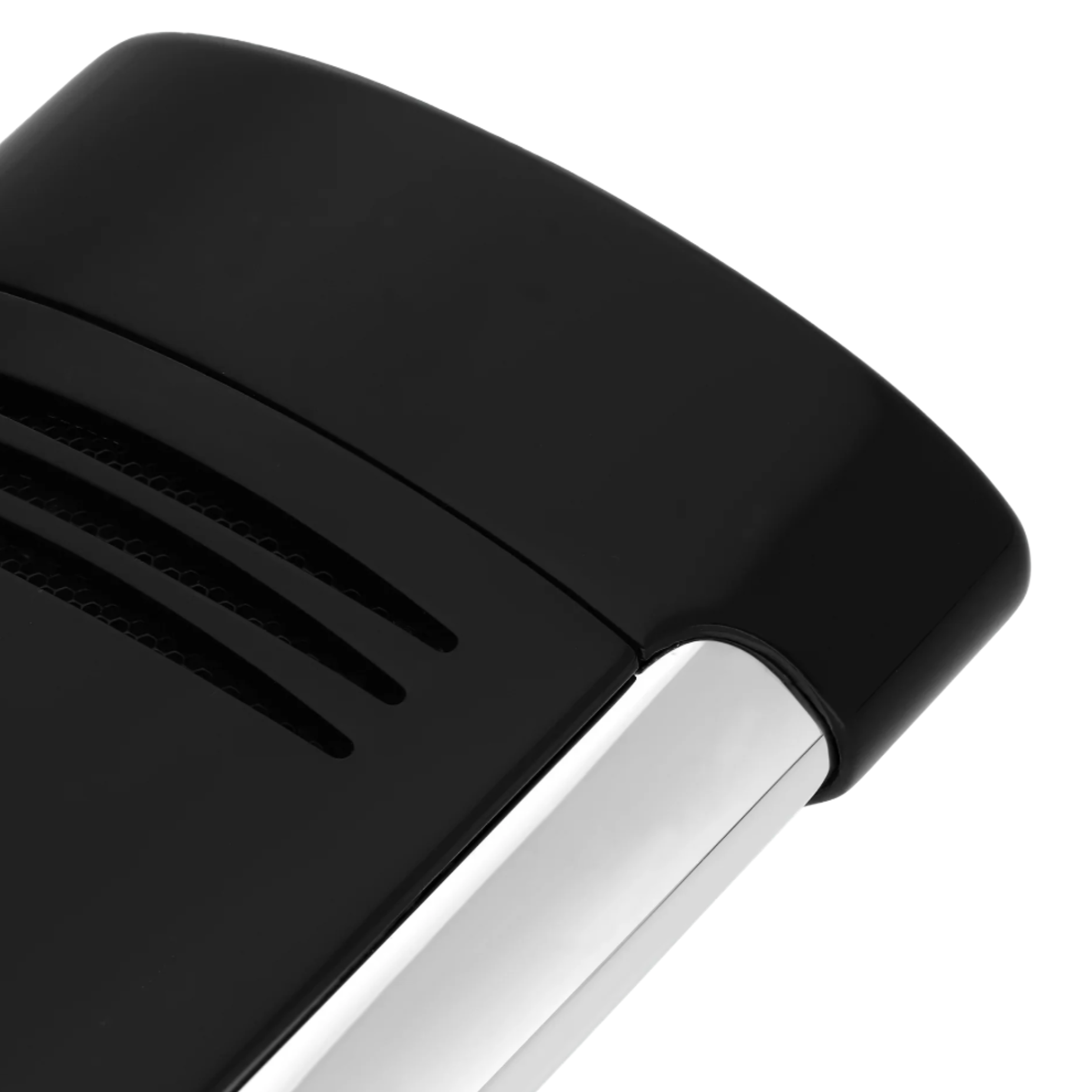 Close-up of a black electronic device with a metallic edge on a white background