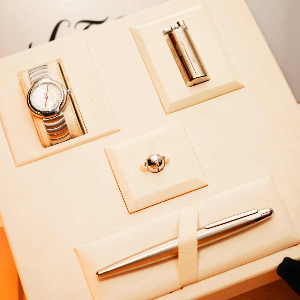 The Vintage Extremely Rare Alfred Dunhill Full Set GMT in solid stainless steel by Lucy Lighter includes a wristwatch, luxury lighter, ring, and silver pen in a cream box—all backed by a quality guarantee.