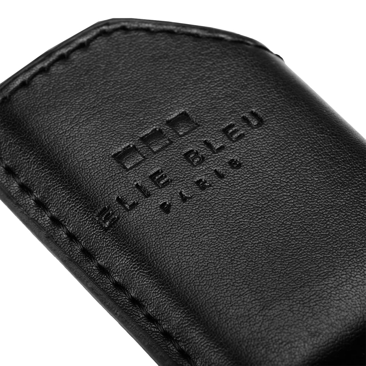 Close-up of a black leather pouch or sleeve with visible stitching and an embossed logo reading ELIE BLEU PARIS on a white background.