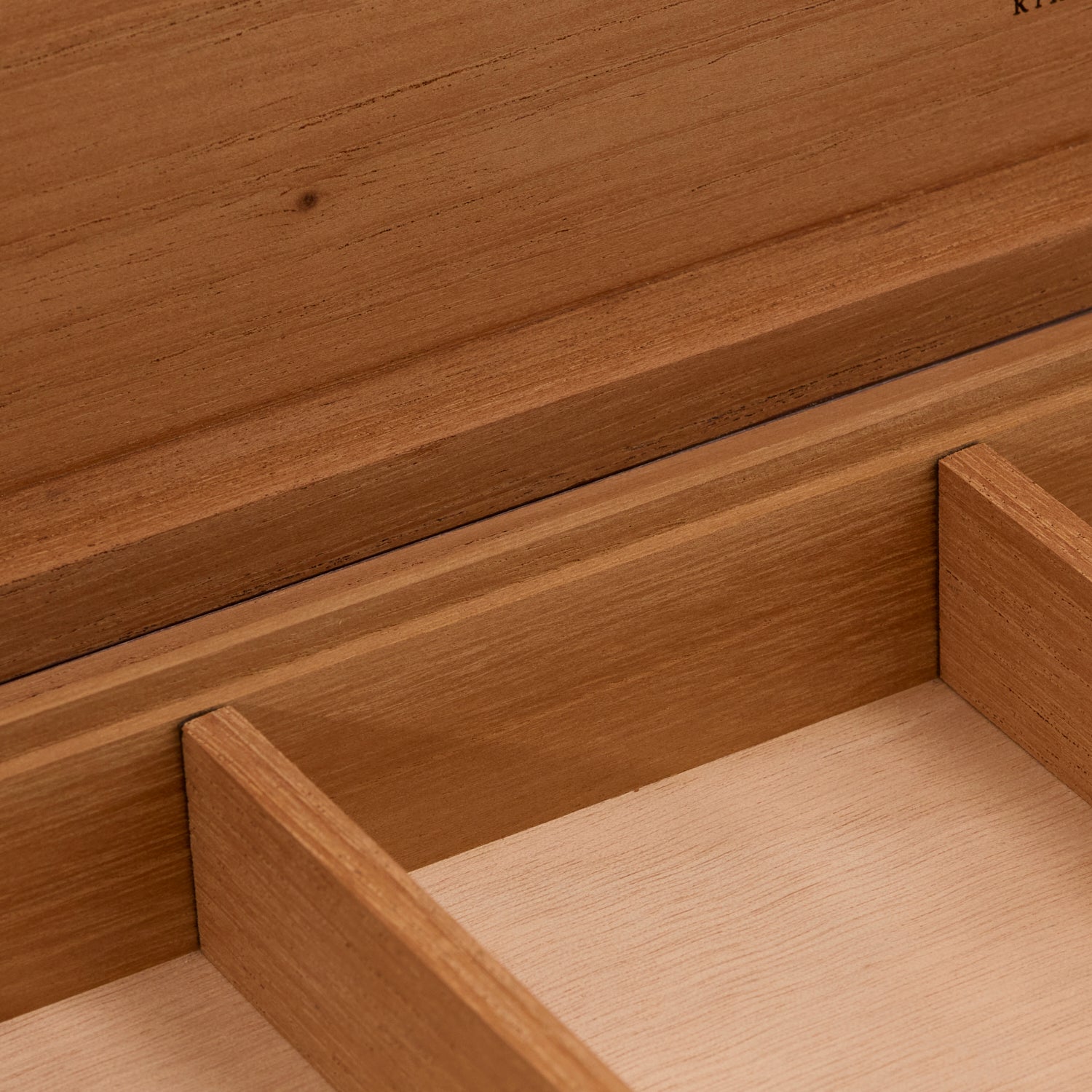 Close-up of a wooden drawer with a smooth finish