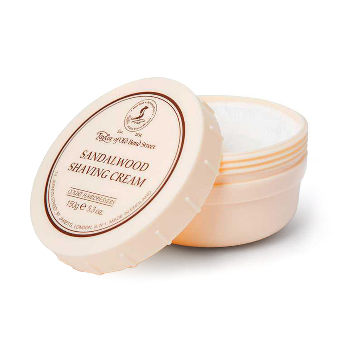 Cream-colored ceramic bowl containing sandalwood shaving cream with labeled lid, 150g size.