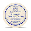 Cream-colored bowl with blue circular label reading "Taylor of Old Bond Street Almond Shaving Cream," 150g.