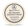 Cream-colored ceramic bowl with dark blue circular label reading "Taylor of Old Bond Street Mr Taylor's Shaving Cream," 150g.