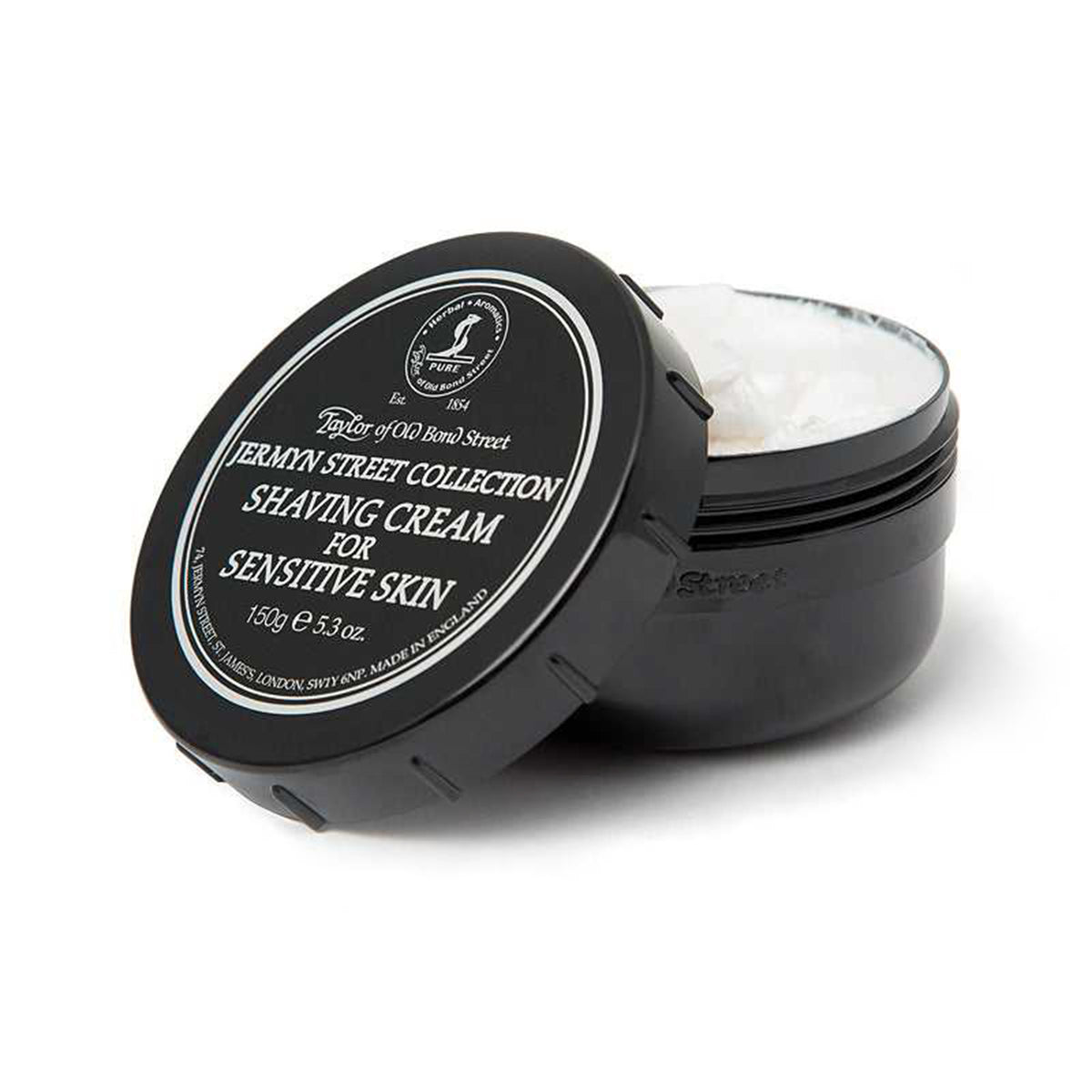 Black ceramic bowl with white shaving cream inside and black lid labeled "Taylor of Old Bond Street Jermyn Street Collection 
