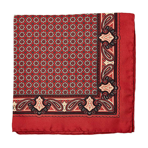 The Sovereign Grade 100% Silk Crimson Pocket Square from KirbyAllison.com is crafted from luxurious silk and features a rich crimson color, adding a bold and elegant touch to any ensemble.