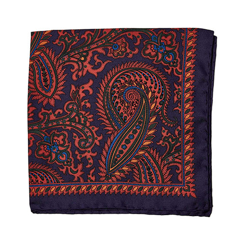 A tailor-made Sovereign Grade 100% Silk Large Paisley Navy Pocket Square provided by KirbyAllison.com, featuring luxurious silk with an intricate large paisley pattern in navy and orange, adding a sophisticated touch to your ensemble, set against a white background.