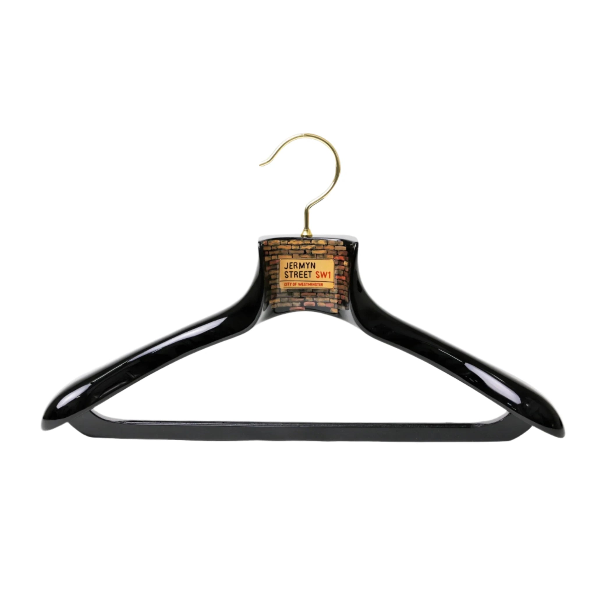 The Nakata Wajima Urushi Jermyn Street Limited Edition Hanger from KirbyAllison.com is a black wooden clothes hanger with a metal hook, crafted from hand-planed wood and featuring a "Jermyn Street SW1" street sign design at the top. This elegant hanger adds a touch of sophistication to your wardrobe.