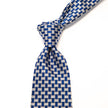 A KirbyAllison.com Sovereign Grade Blue Basket Weave Silk Tie on a white background.