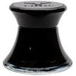 Black glass ink bottle with dome-shaped lid stamped with Visconti branding and visible black ink inside.