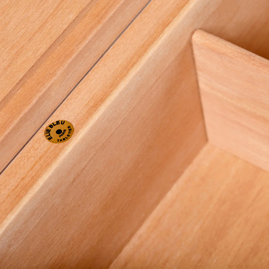 A close up of an Elie Bleu Amboyna Burl "Classic" Humidor - 110 Cigars tabletop humidor.