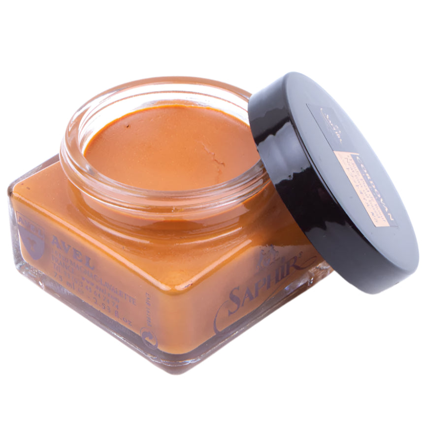A jar of Saphir Cordovan Cream Shoe Polish by KirbyAllison.com on a white background.