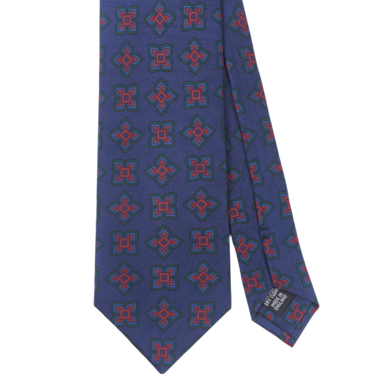 A KirbyAllison.com Sovereign Grade Navy Large Medallion Ancient Madder Tie, 150cm with red and blue flowers on it.