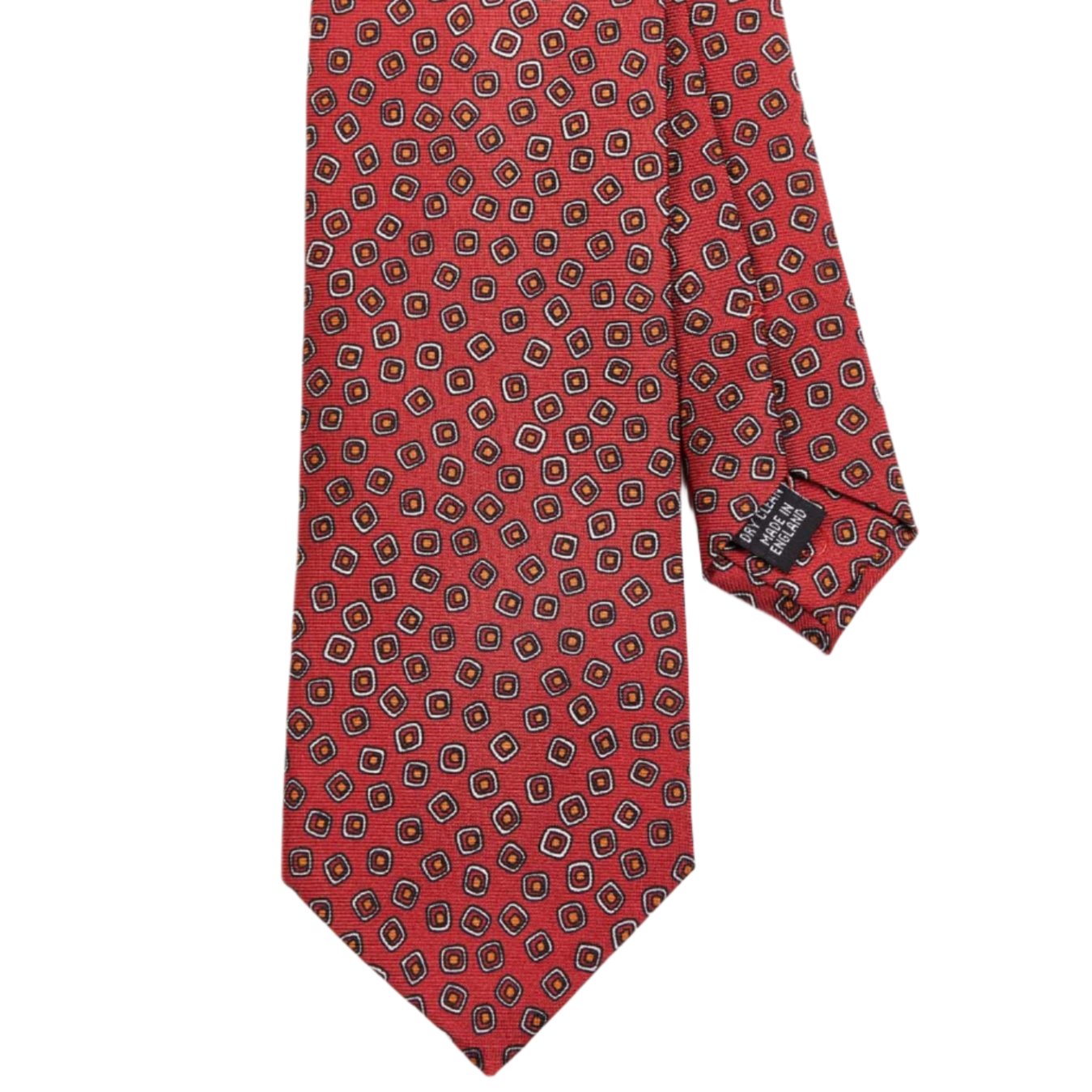 A Sovereign Grade Red Eton Printed Silk tie with a black and white pattern, crafted for longevity, brought to you by KirbyAllison.com.