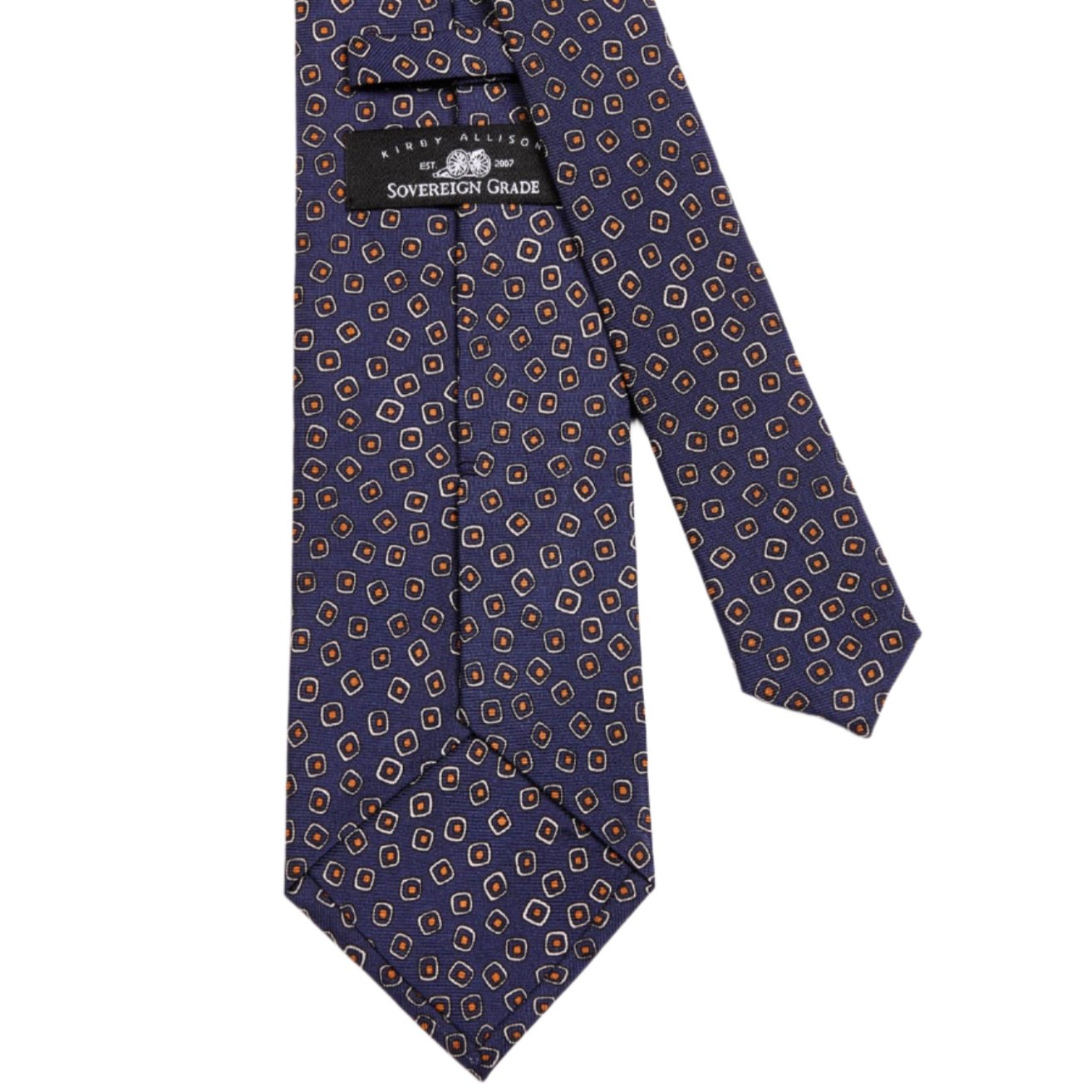 A Sovereign Grade Navy/White Eton Printed Silk Tie, 150cm made of 100% English silk with a pattern, handmade in the United Kingdom from KirbyAllison.com.