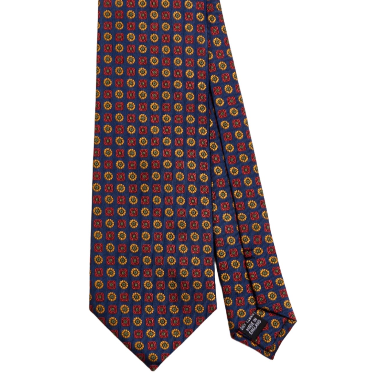 A Sovereign Grade Navy Floral Jacquard Tie, 150 cm by KirbyAllison.com with a red, blue, and yellow pattern providing longevity to your style.