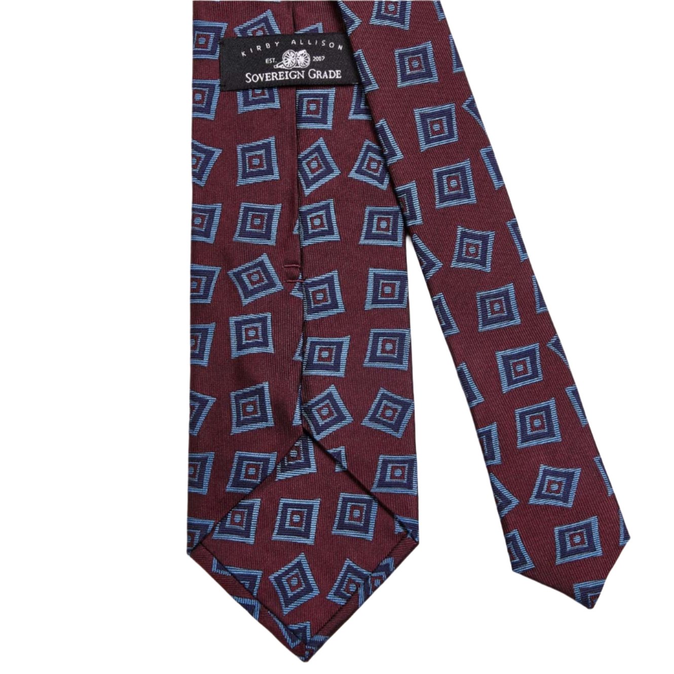 A Sovereign Grade Oxblood Art Deco Jacquard Tie, 150 cm from KirbyAllison.com with blue and red designs showcasing quality craftsmanship.