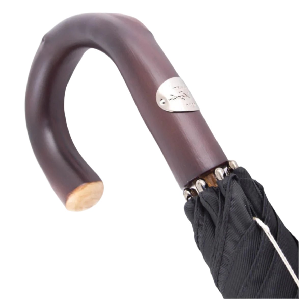 A close up of a KirbyAllison.com Black Doorman Umbrella with Chestnut Handle providing rain protection.