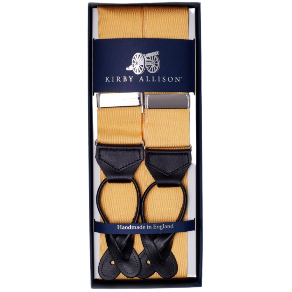 A pair of adjustable yellow suspenders (Sovereign Grade Solid Champagne Braces) in a box, from KirbyAllison.com.