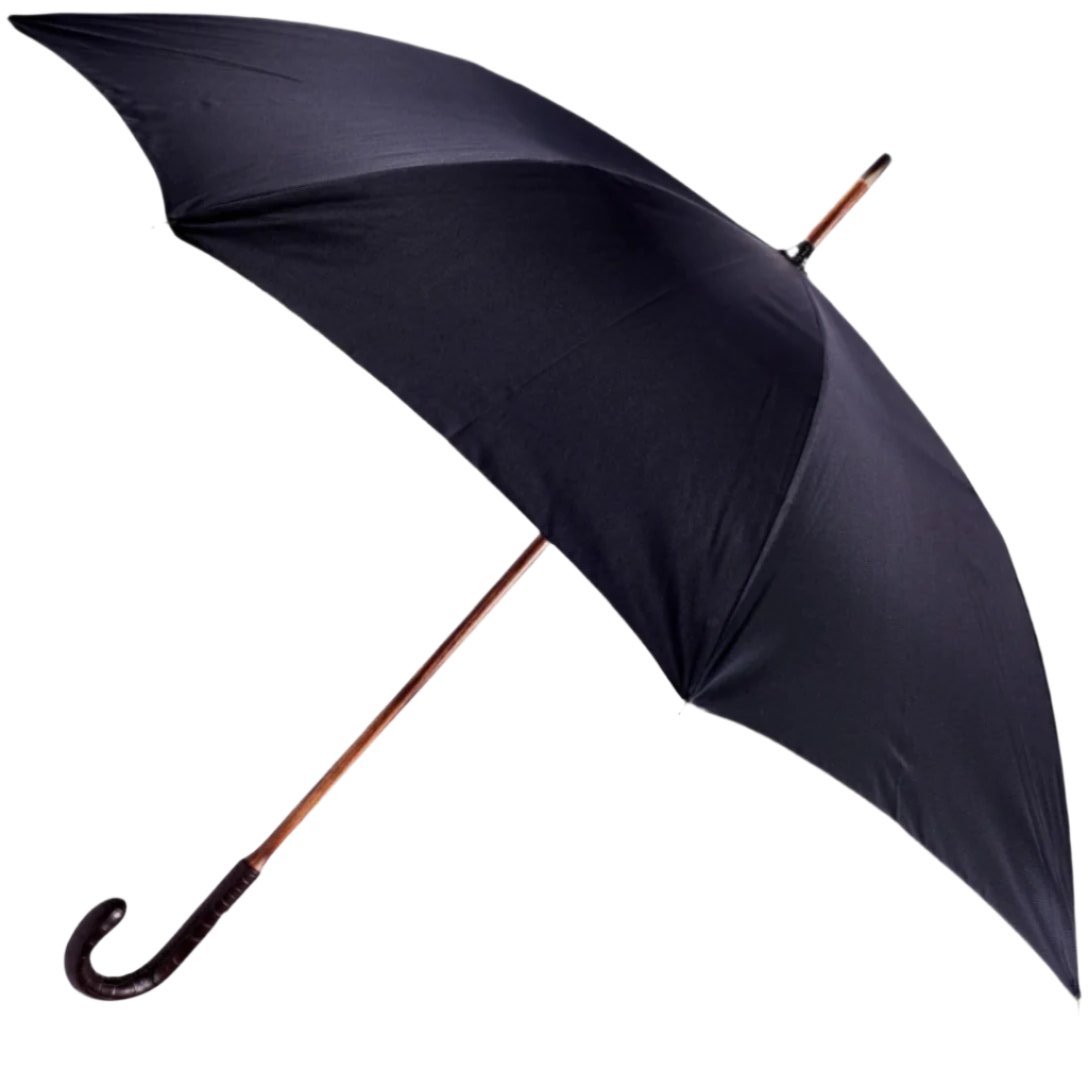 A KirbyAllison.com Brown Alligator Solid Stick umbrella with a wooden handle on a white background.