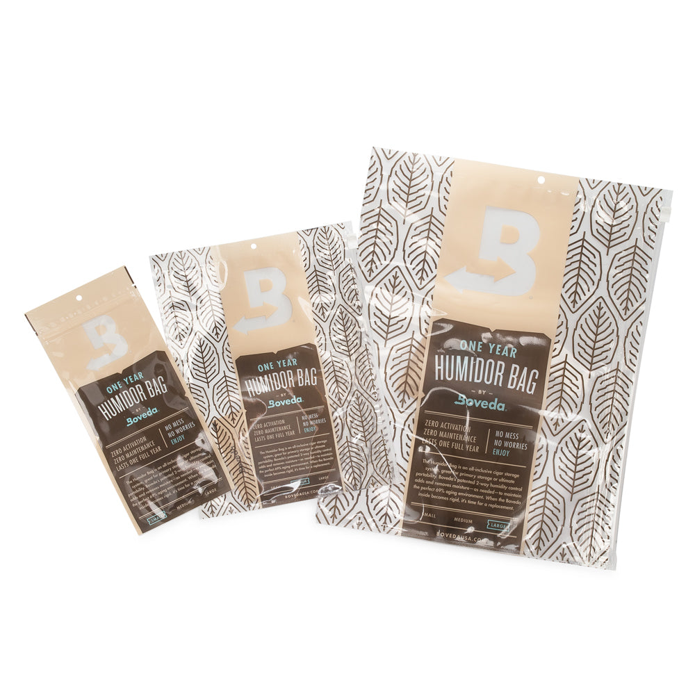 Three KirbyAllison.com Boveda Humidor Bags - Medium designed to maintain humidity for cigars.