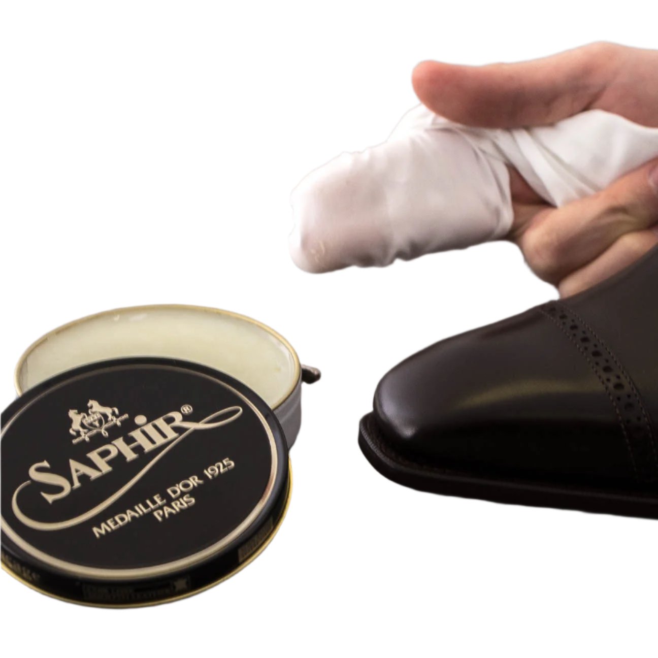 A person using the Wellington High-Shine Cotton Chamois from KirbyAllison.com to achieve a high-shine on a shoe.