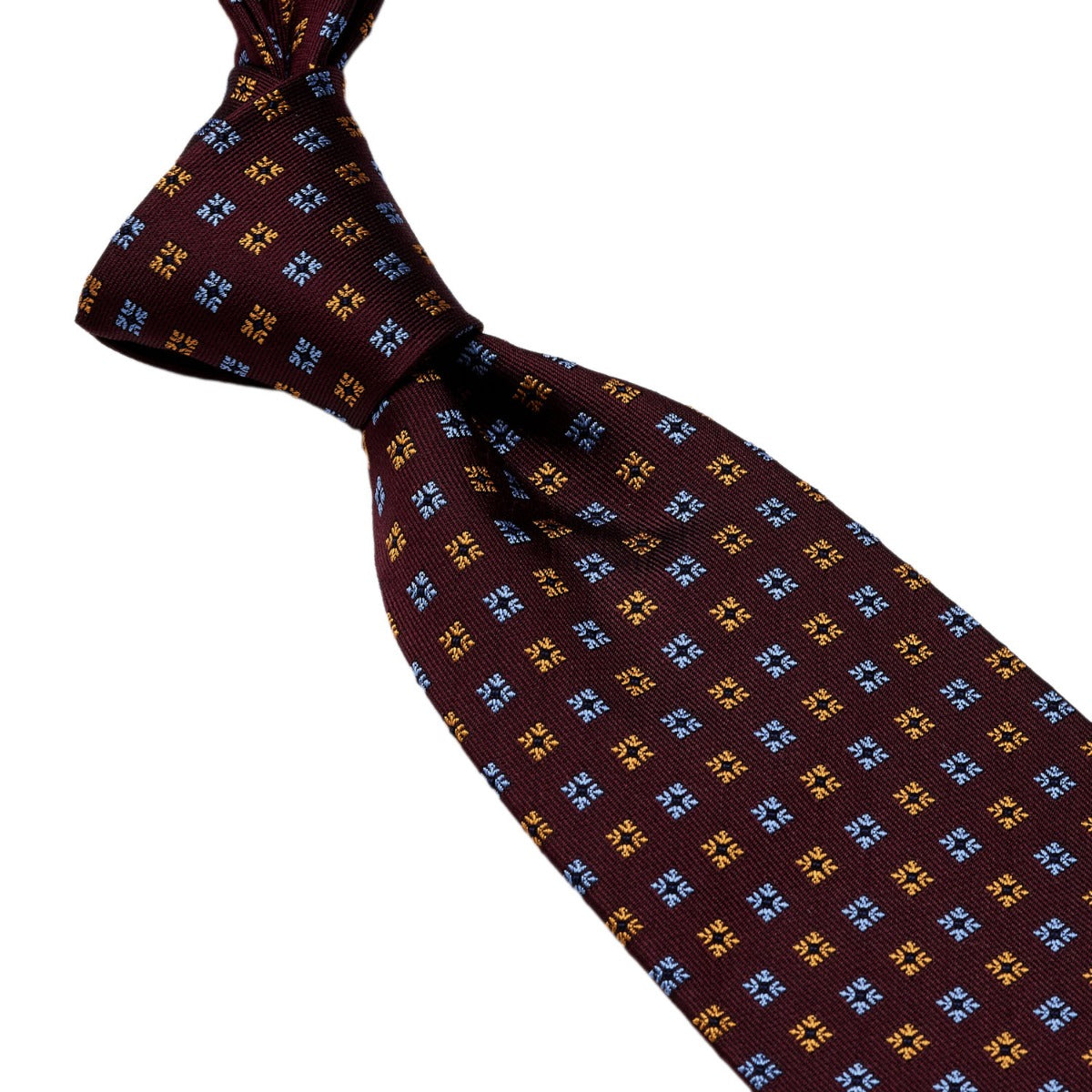 A high-quality Sovereign Grade Burgundy Diamond Motif Jacquard Tie by KirbyAllison.com with blue and brown squares.