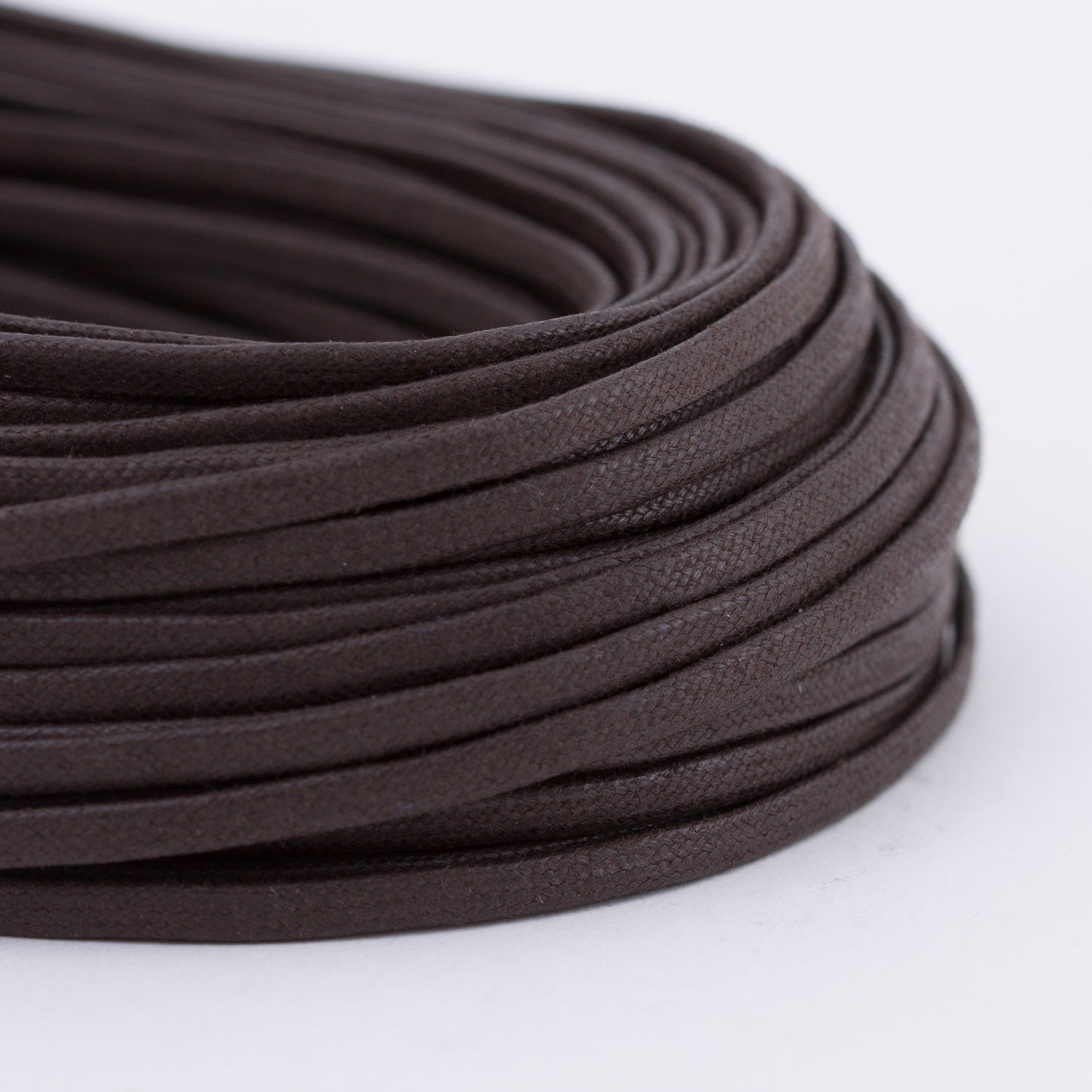 A close-up of a Wellington Flat Waxed Dress Shoelaces, sold by KirbyAllison.com, used as replacement shoelaces for dress shoes.