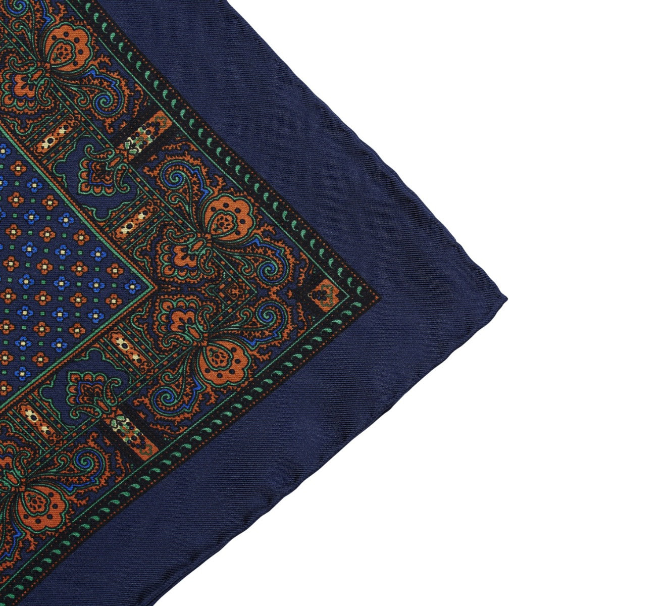 A Sovereign Grade 100% Silk Navy Repeating Floral pocket square with hand-rolled edges, available in blue and orange and suitable for formal events, by KirbyAllison.com.