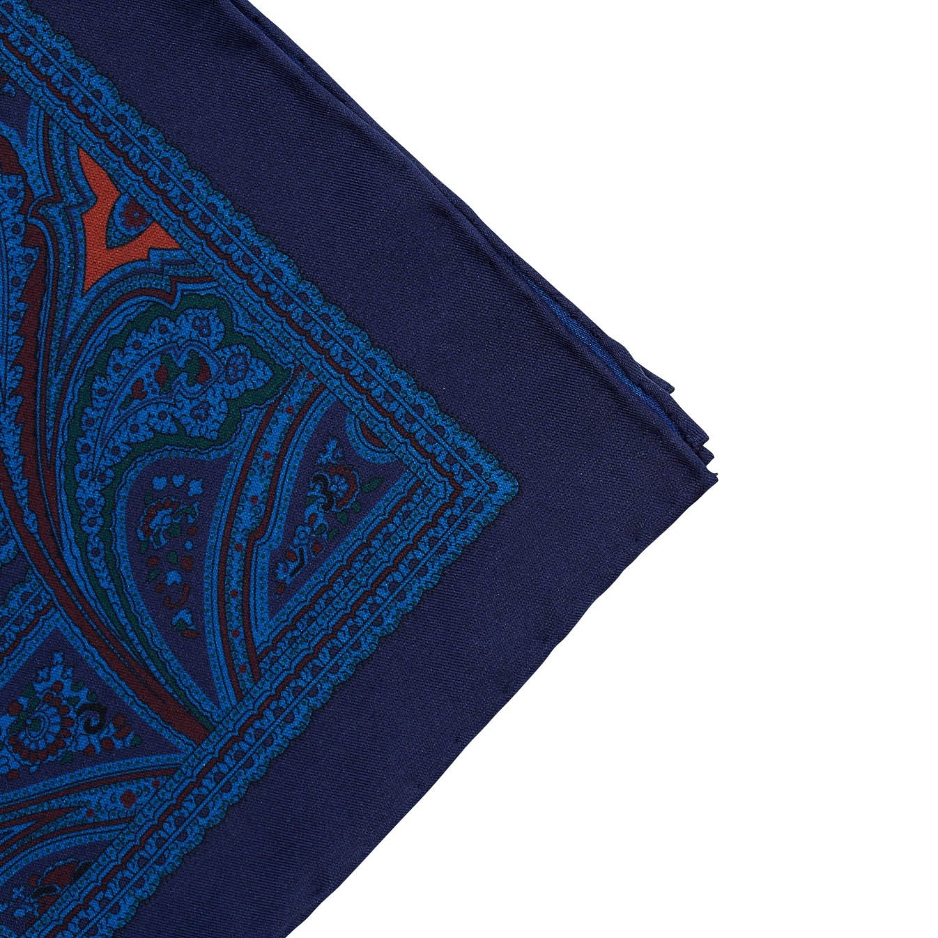 A Sovereign Grade Ancient Madder Midnight Pocket Square with hand-rolled edges on a white background from KirbyAllison.com.