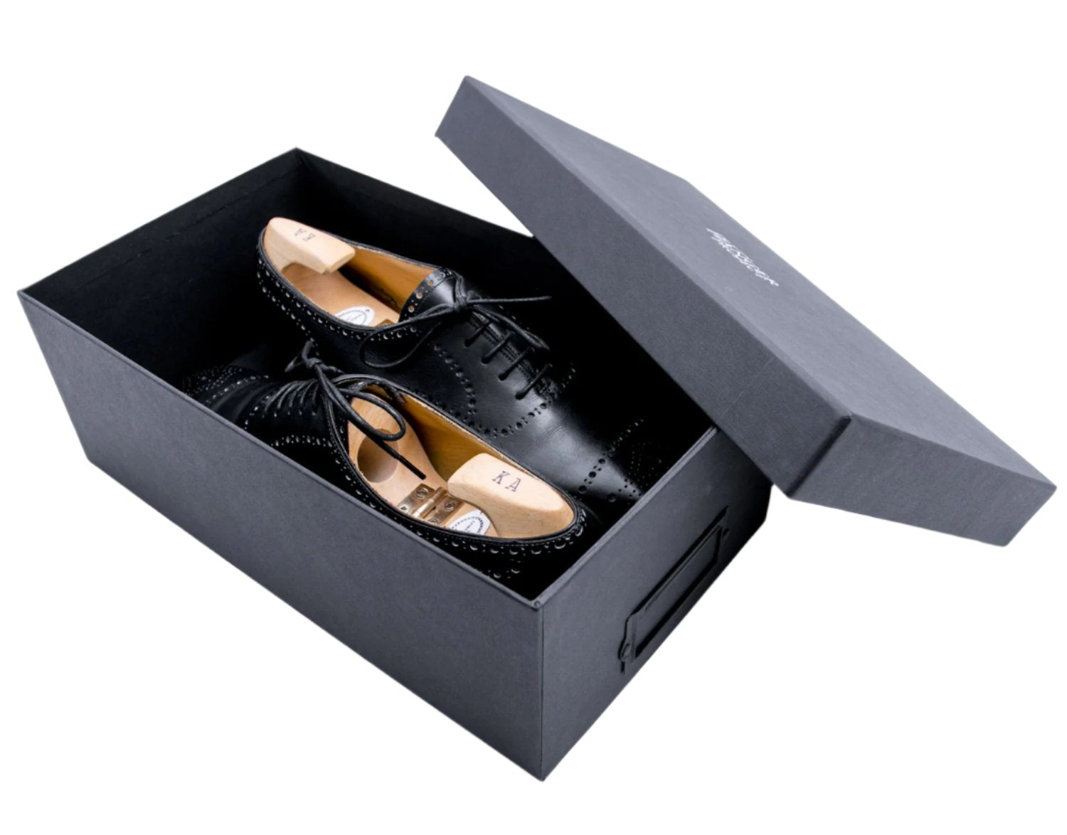 A pair of black Deluxe Wellington Shoe Storage Box shoes by KirbyAllison.com.