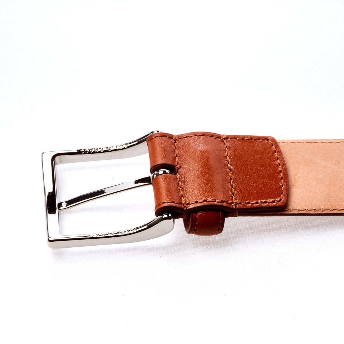 A Sovereign Grade Light Brown Calfskin Dress Belt from KirbyAllison.com on a white background.
