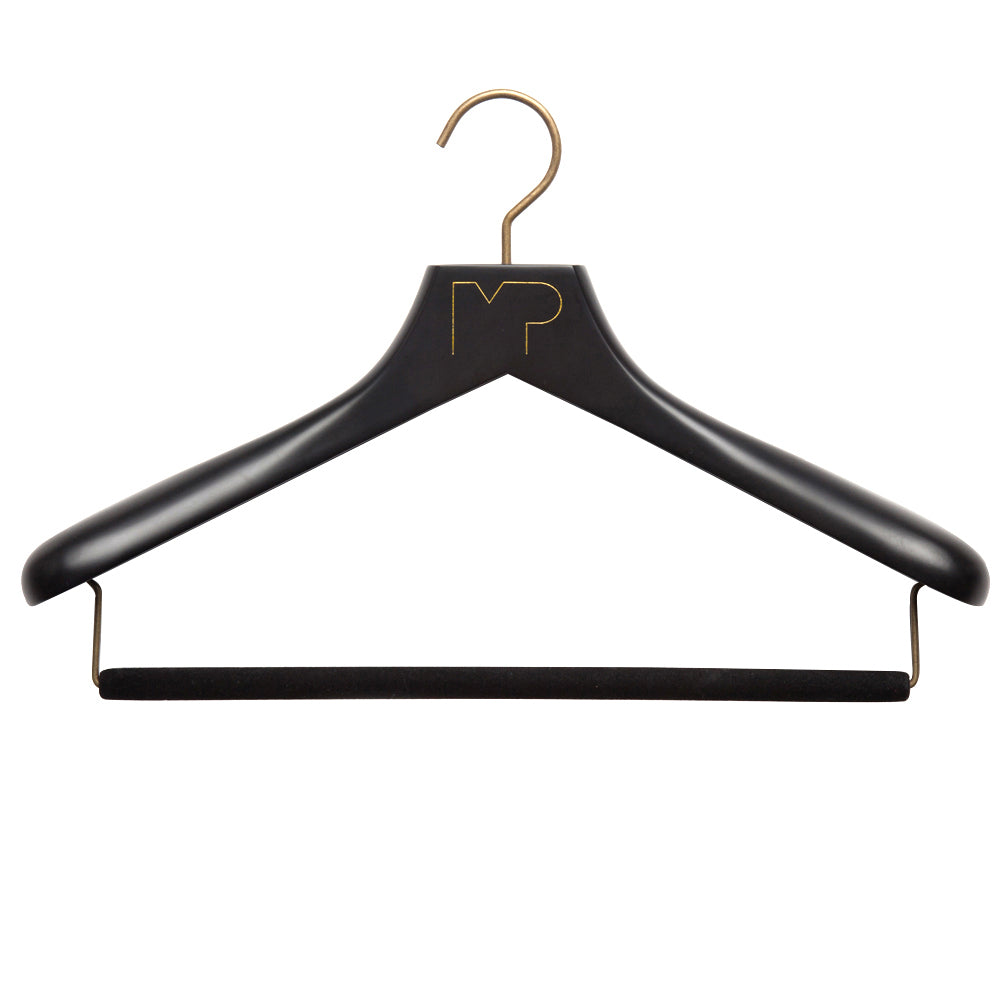 A Custom Luxury Wooden Suit Hanger with custom finishing by KirbyAllison.com.